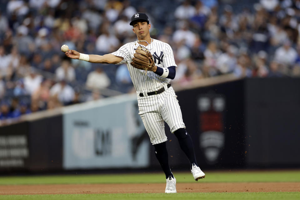 New York Yankees shortstop Oswaldo Cabrera throws out Toronto Blue Jays' Lourdes Gurriel Jr. during the first inning of a baseball game Thursday, Aug. 18, 2022, in New York. (AP Photo/Adam Hunger)