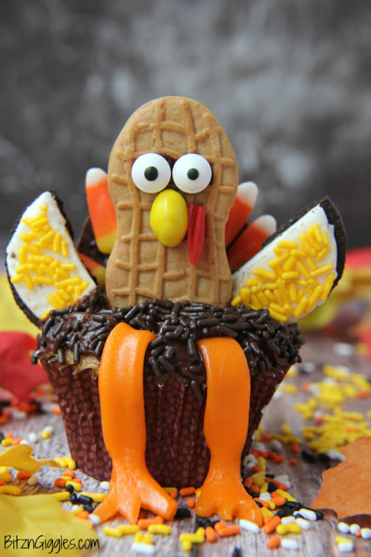 <p>Bitz & Giggles</p><p> Feel free to use your favorite cupcake recipe along with your favorite chocolate frosting recipe.</p><p><strong>Get the recipe:</strong> <a href="https://bitzngiggles.com/tom-turkey-cupcakes/" rel="nofollow noopener" target="_blank" data-ylk="slk:Tom Turkey Cupcakes;elm:context_link;itc:0;sec:content-canvas" class="link rapid-noclick-resp"><strong>Tom Turkey Cupcakes</strong></a></p>