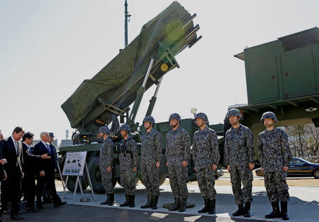 U.S. Vice President Mike Pence inspects PAC-3 missile interceptors with Japan's Defense Minister Itsunori Onodera at the Defense Ministry in Tokyo, Japan February 7, 2018. REUTERS/Toru Hanai