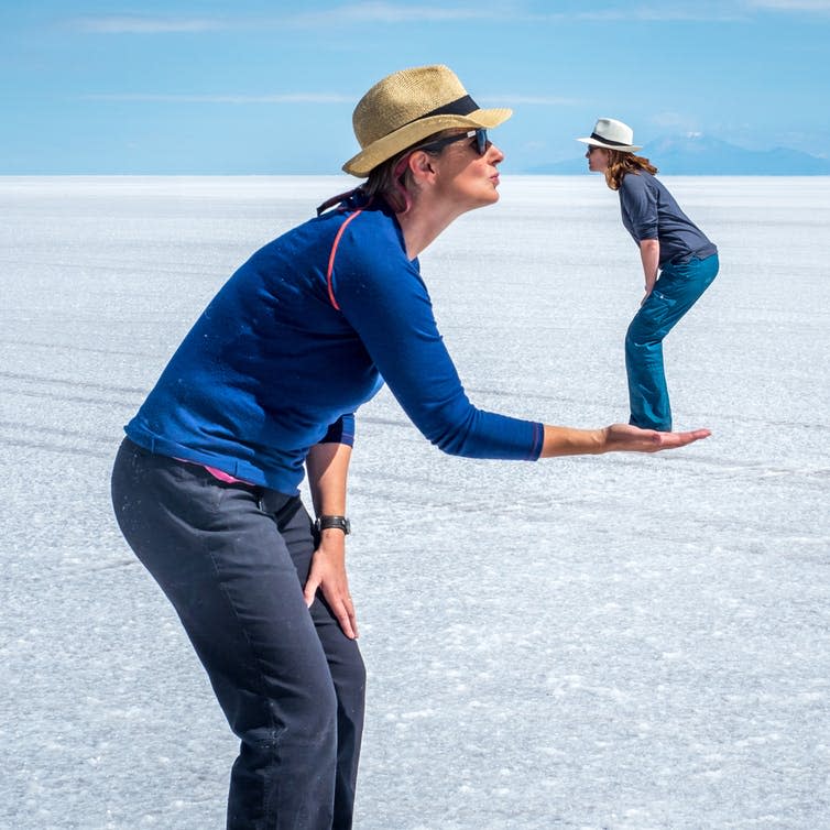 <span class="caption">Say cheese!</span> <span class="attribution"><a class="link " href="https://www.shutterstock.com/image-photo/dark-haired-female-stands-on-bolivian-1064148797?src=gPdxM8SKfMFcYrv10uoU5A-1-40" rel="nofollow noopener" target="_blank" data-ylk="slk:Shutterstock.;elm:context_link;itc:0;sec:content-canvas">Shutterstock.</a></span>