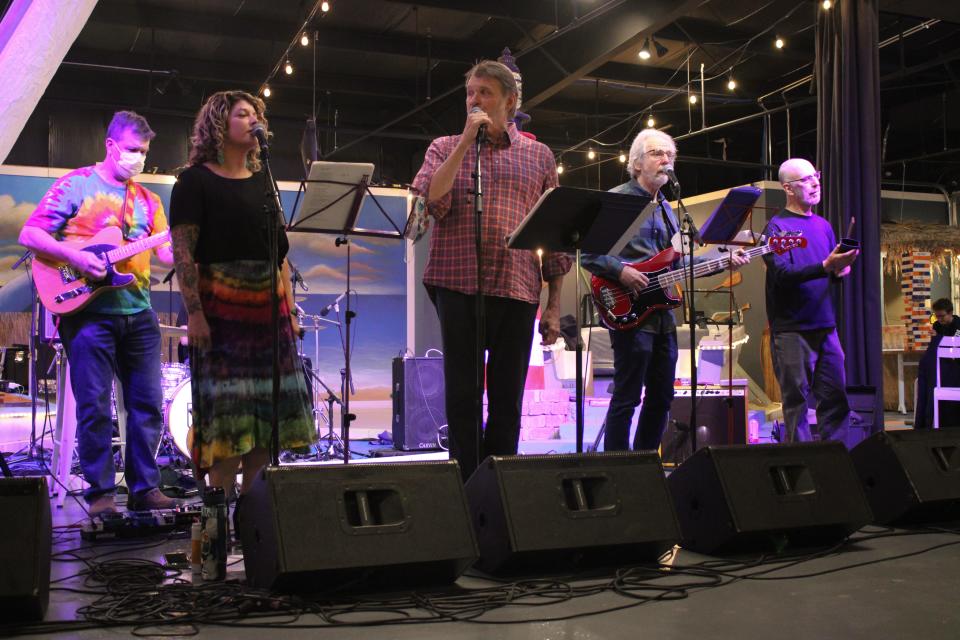 The Recliners, an Iowa City-based eight member ensemble, performs at Tavern Blue as part of Coralville Pride Festival on Nov. 7.