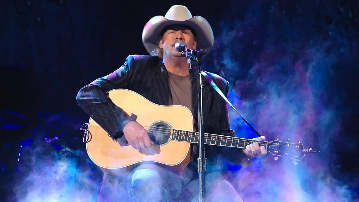 Alan Jackson performing on stage