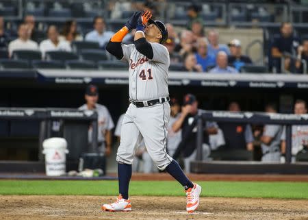 Aug 30, 2018; Bronx, NY, USA; Detroit Tigers designated hitter Victor Martinez (41) hits a game tying two run home run in the ninth inning against the New York Yankees at Yankee Stadium. Mandatory Credit: Wendell Cruz-USA TODAY Sports