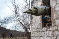 <p>“Scars of Independence”: Anukhva, Abkhazia. 2013. An unguided missile launching mount, left in an Orthodox church destroyed during the war. (© Olga Ingurazova from “War Is Only Half the Story,” the Aftermath Project & Dewi Lewis Publishing) </p>