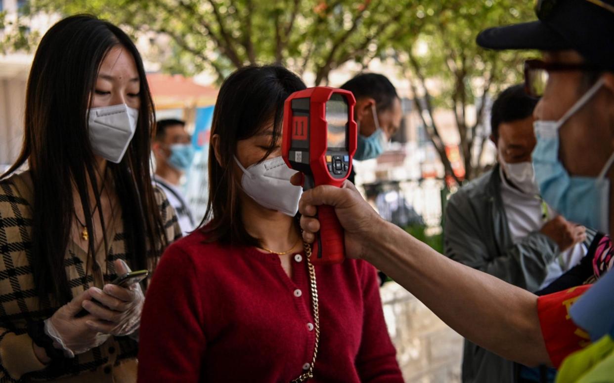 China has faced hostility from nations all around the globe over its handling of the initial coronavirus outbreak - Hector Retamal/AFP