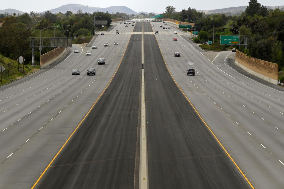 Light traffic is seen in the afternoon on the 118 Ronald Reagan freeway, Sunday, in Simi Valley, California. The highway is usually much busier on a Sunday afternoon.