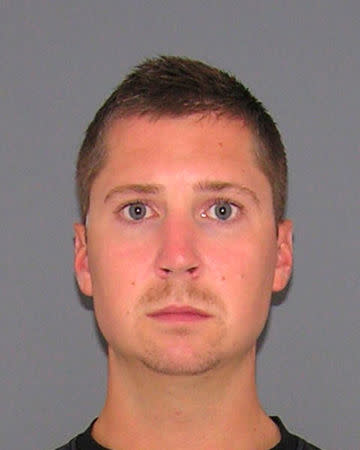 FILE PHOTO - Former University of Cincinnati police officer Ray Tensing, charged with murdering a black man in a traffic stop, is seen in an undated booking photo released from the Hamilton County Sheriff's Office in Ohio, U.S. on July 29, 2015. Courtesy Hamilton County Sheriff's Office/Handout via REUTERS