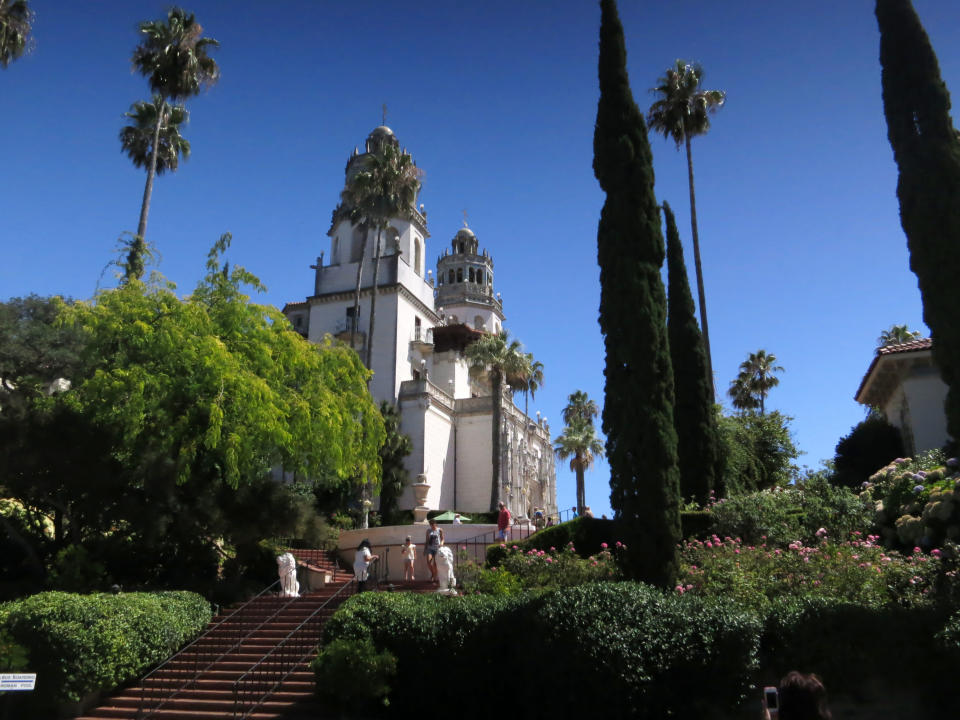 This Aug. 30, 2013 photo shows the exterior of Hearst Castle, the 165-room estate of newspaper publisher William Randolph Hearst, in San Simeon, Calif. Visitors can tour the estate which he called "La Cuesta Encantada" ("The Enchanted Hill"), that overlooks the Pacific Ocean. (AP Photo/Jim MacMillan)