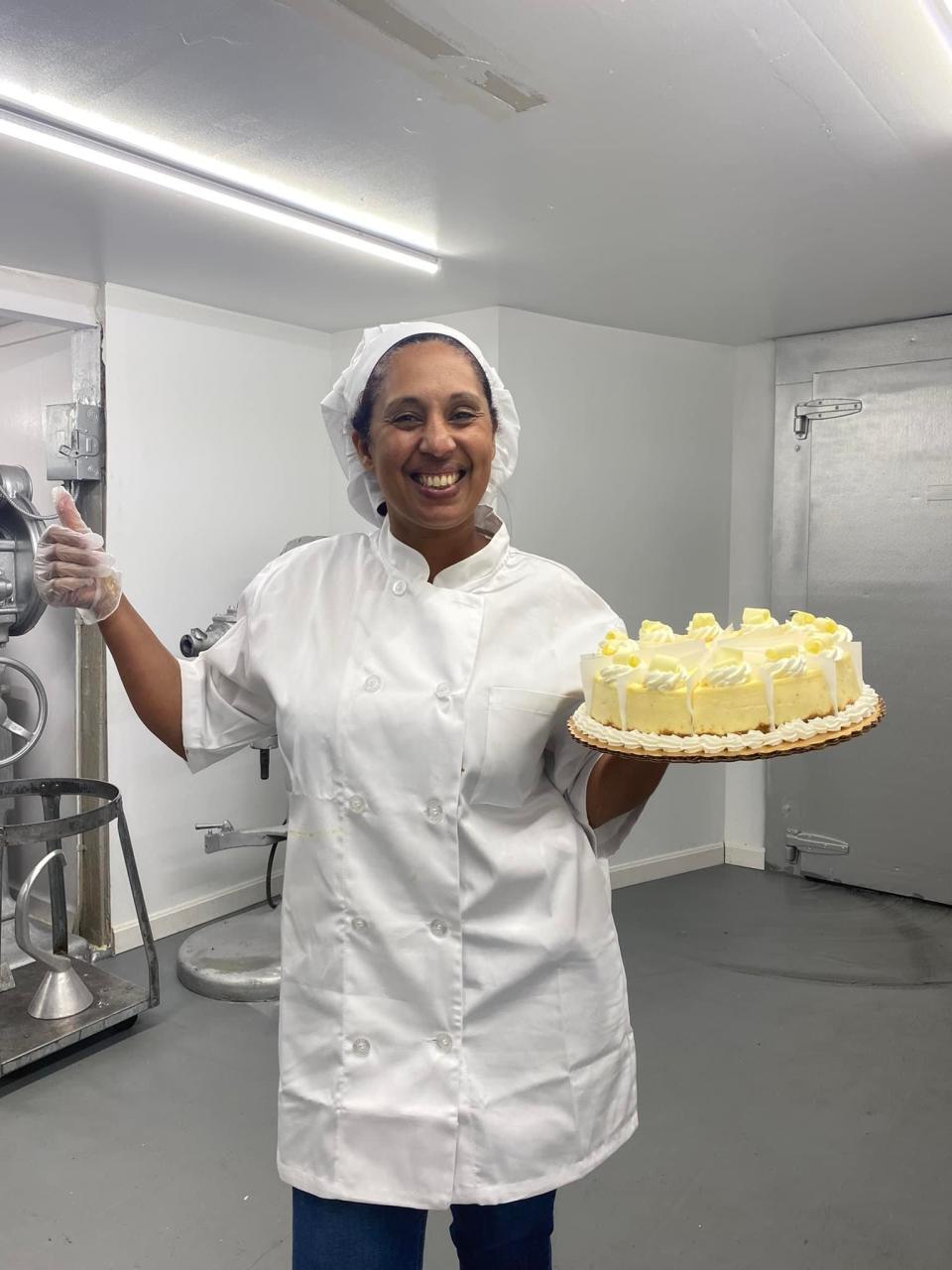 Guchanya Pastry owner Marie Maranda brings a plate of desserts for patrons to enjoy in her new shop that opened on June 2.