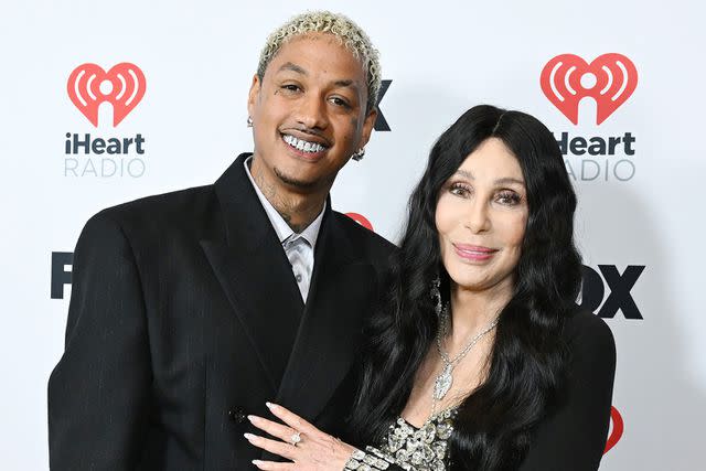 <p>Gilbert Flores/Billboard via Getty</p> Alexander "AE" Edwards and Cher at the iHeartRadio Music Awards in Los Angeles in April 2024