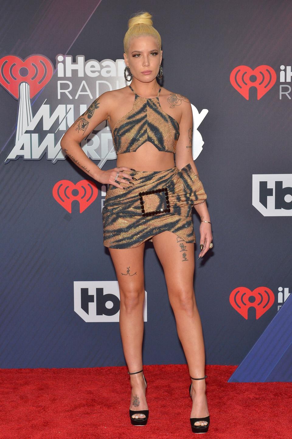 INGLEWOOD, CA - MARCH 11:  Halsey arrives at the 2018 iHeartRadio Music Awards which broadcasted live on TBS, TNT, and truTV at The Forum on March 11, 2018 in Inglewood, California.  (Photo by Rachel Murray/Getty Images)