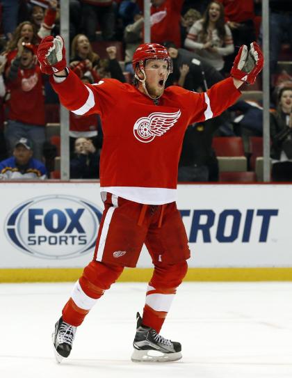 The Wings' Justin Abdelkader scored an OT winner with a broken stick against the Blues. (AP)