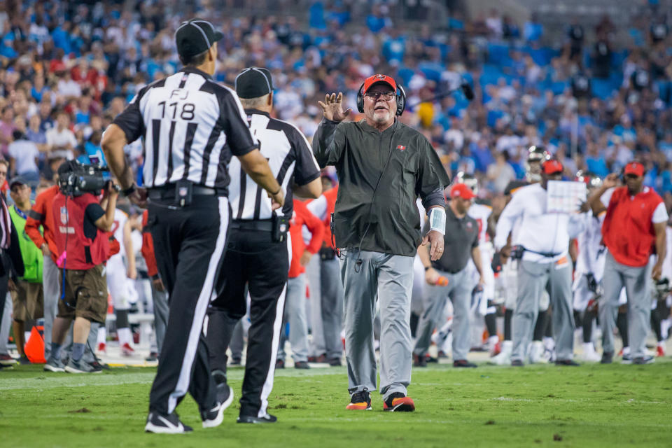 Tampa Bay Buccaneers coach Bruce Arians talks with officials during Thursday night's game. (Getty Images)