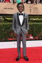 <p>Wearing a pin striped suit, paired with loafers. <em>[Photo: Getty]</em> </p>