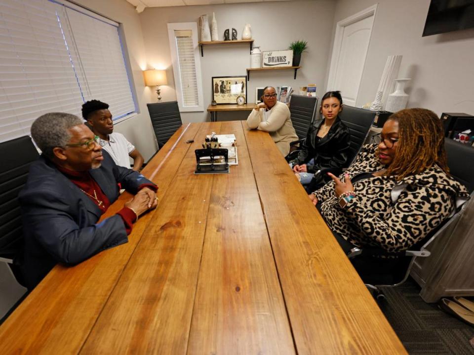 Advocate VJ Smith, (clockwise from left) participant Jeremy, 16, advocate Tyisha Heath, participant Grace, 16, and criminal defense attorney MarQuetta A. Clayton visit during a Youth Advocate Programs meeting in Fort Worth Texas, Wednesday Apr 03, 2024. The program has a staff of 22 that currently serve more than 65 participants. (Special to the Star-Telegram Bob Booth) Bob Booth/Bob Booth