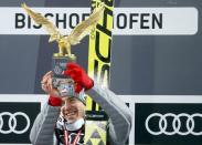 Ski Jumping - 65th four-hills ski jumping tournament final round - Bischofshofen, Austria - 06/01/2017 - Poland's Kamil Stoch celebrates after winning the 65th four-hills tournament. REUTERS/Dominic Ebenbichler