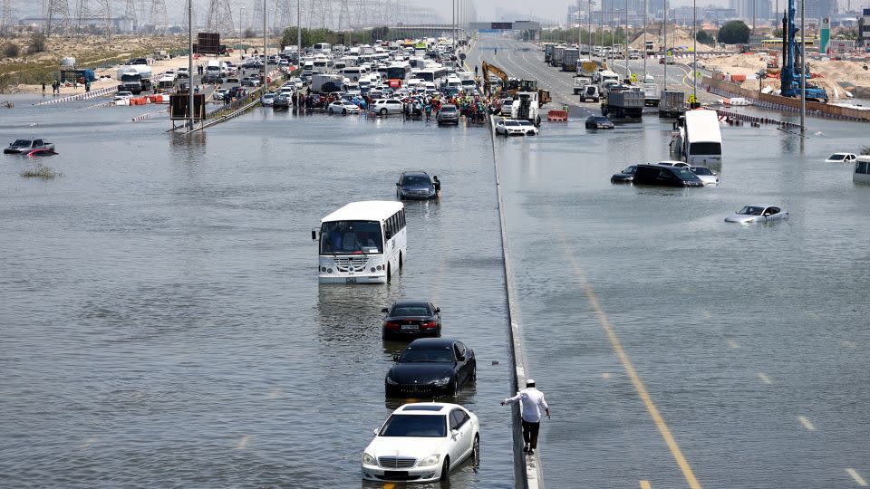 A general view of abandoned vehicles on a flooded highway can be seen on April 18, 2024 in Dubai. - Francois Nel/Getty Images