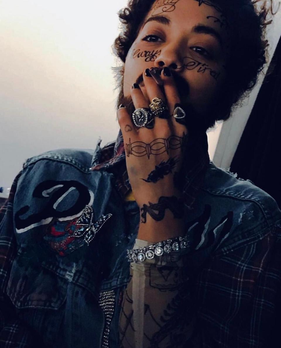 <p>People were shocked to see a nearly unrecognizable Rita Ora dress (tattoos and all) as fellow artist Post Malone. Now, we're just wondering how long it took to get those fake tats off her face... </p>