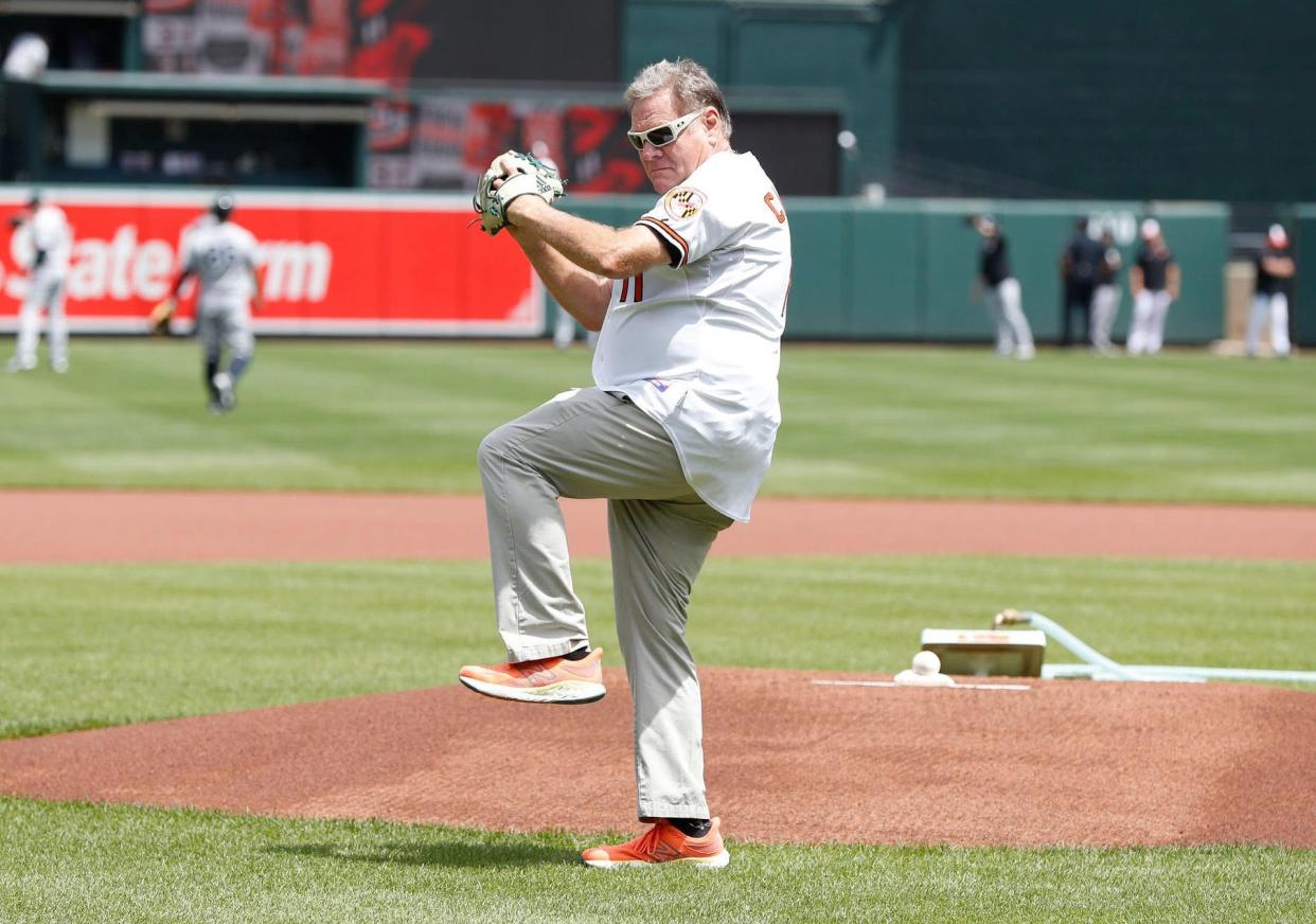 Pat Calhoon gets set to deliver the opening pitch before a Baltimore Orioles game against the New York Yankees last month at Camden Yards.