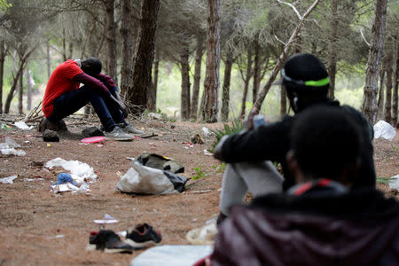 African migrants are seen in their hiding place in the Moroccan mountains near the city of Tangier, Morocco September 6, 2018. REUTERS/Youssef Boudlal