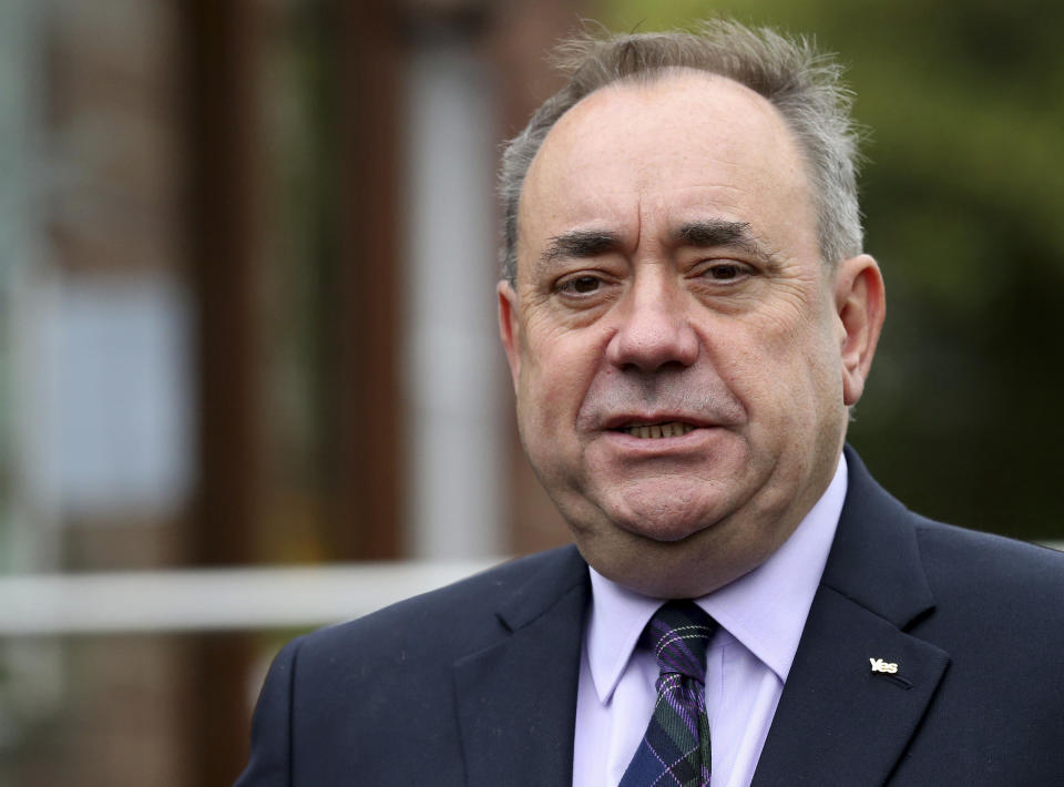 FILE - In this Thursday, Sept. 18, 2014 file photo, Scotland's former First Minister Alex Salmond poses for photographs in Turriff, Scotland. Former allies Scotland's politicians Alex Salmond and Nicola Sturgeon have been trading accusations in a feud that seems to be tearing apart their Scottish National Party, as Salmond is scheduled to appear at a Scottish Parliament inquiry Wednesday Feb. 24, 2021. (AP Photo/Scott Heppell, file)