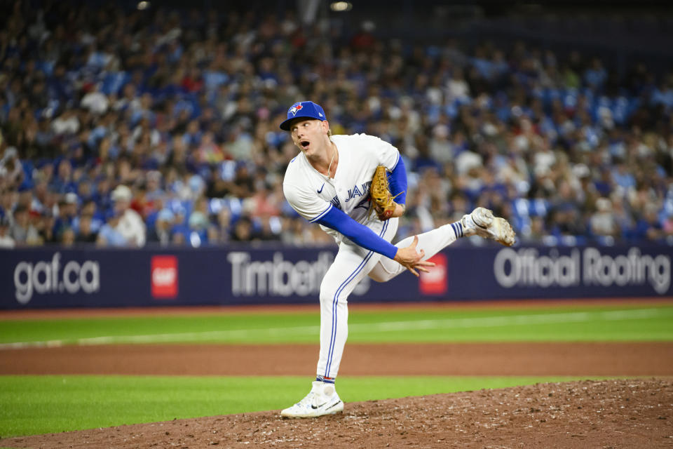 Toronto Blue Jays pitcher Bowden Francis works against the Cleveland Guardians during the ninth inning of a baseball game in Toronto, Friday, Aug. 25, 2023. (Christopher Katsarov/The Canadian Press via AP)