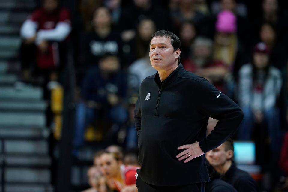 Ohio State coach Kevin McGuff watches during the first half of the team's NCAA college basketball game against Indiana, Thursday, Jan. 26, 2023, in Bloomington, Ind. (AP Photo/Darron Cummings)