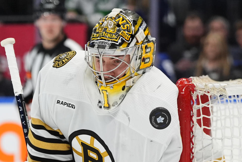 Boston Bruins goaltender Jeremy Swayman covers the post and makes a save against the Toronto Maple Leafs during second-period NHL hockey game action in Toronto, Monday, March 4, 2024. (Frank Gunn/The Canadian Press via AP)