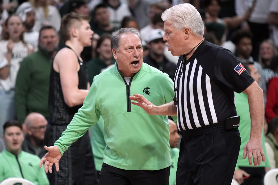 Michigan State head coach Tom Izzo disputes a call with a referee during the first half of an NCAA college basketball game against Illinois, Saturday, Feb. 10, 2024, in East Lansing, Mich. (AP Photo/Carlos Osorio)