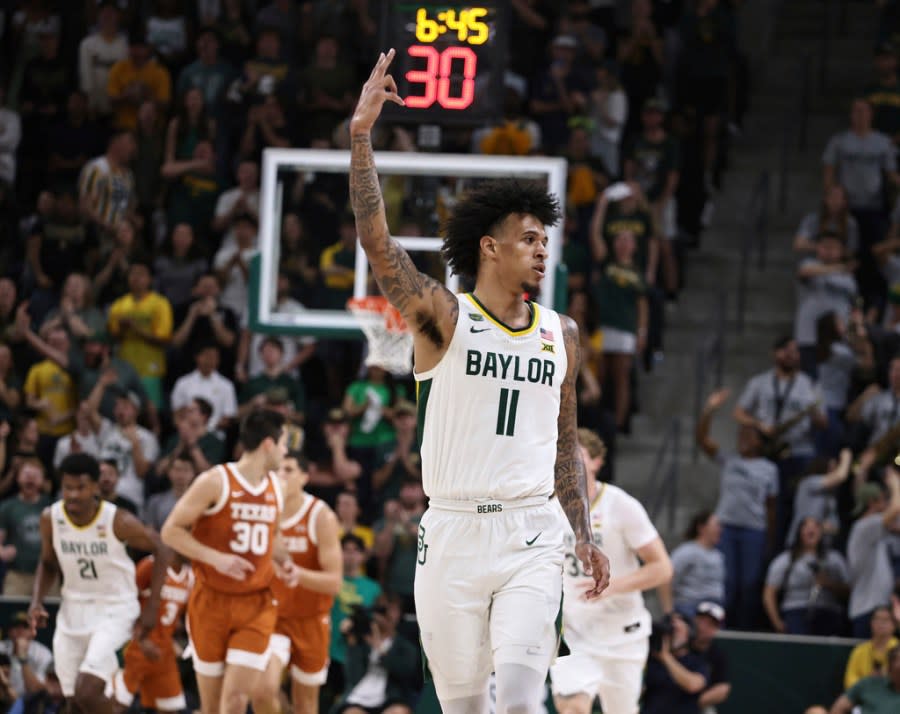 Baylor forward Jalen Bridges reacts to his three-point play against Texas in the first half of an NCAA college basketball game, Monday, March 4, 2024, in Waco, Texas. (Rod Aydelotte/Waco Tribune-Herald via AP)