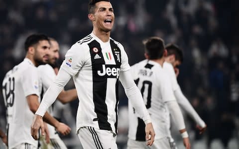 Juventus' Portuguese forward Cristiano Ronaldo celebrates after scoring during the Italian Serie A football match Juventus vs Frosinone on February 15, 2019 - Credit: Getty Images