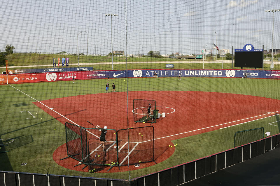 Players for Athletes Unlimited practice on Wednesday, Sept. 16, 2020, in Rosemont, Ill. Elite players are living life in a bubble to prevent the spread of COVID during the inaugural Athletes Unlimited softball season. When they're not at the ballpark or an indoor facility across the parking lot, they are at their hotel or apartment. Everywhere else is off limits to them. (AP Photo/Teresa Crawford)