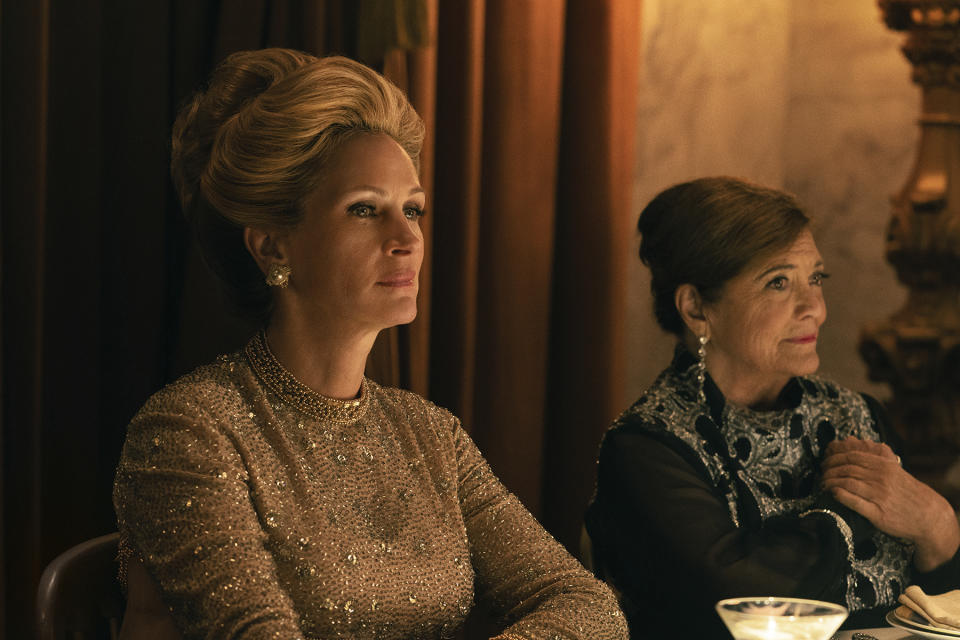 This image released by Starz shows Julia Roberts as Martha Mitchell, left, in a scene from "Gaslit," premiering April 24. (Hilary Bronwyn Gayle/Starz via AP)