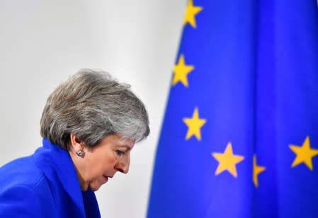 FILE PHOTO: Britain's Prime Minister Theresa May arrives for a news conference after an extraordinary EU leaders summit to finalise and formalise the Brexit agreement in Brussels