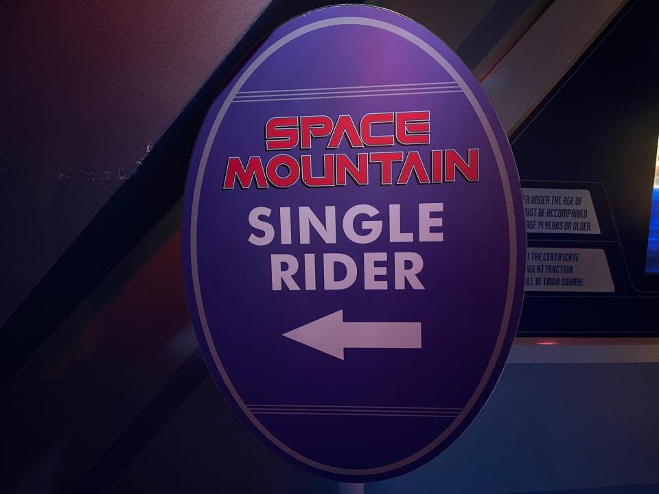 signage for the single rider line at space mountain in disneyland