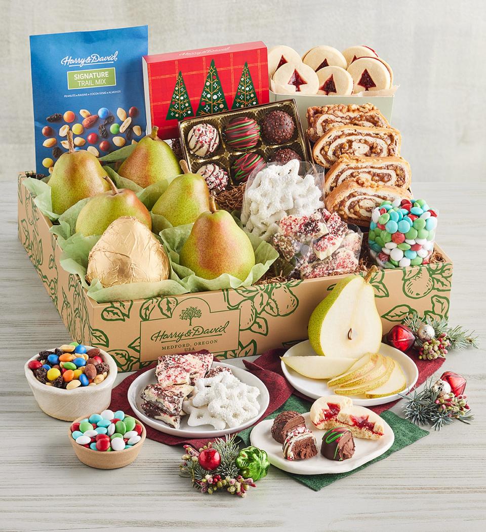 <p><a href="https://go.redirectingat.com?id=74968X1596630&url=https%3A%2F%2Fwww.harryanddavid.com%2Fh%2Fgift-baskets-tower-boxes%2Fseasonal-gift-boxes%2F27252&sref=https%3A%2F%2Fwww.thepioneerwoman.com%2Fholidays-celebrations%2Fgifts%2Fg37792828%2Flast-minute-holiday-gifts%2F" rel="nofollow noopener" target="_blank" data-ylk="slk:Shop Now;elm:context_link;itc:0;sec:content-canvas" class="link ">Shop Now</a></p><p>Grand Christmas Gift Box</p><p>harryanddavid.com</p><p>$79.99</p><span class="copyright">Harry & David</span>