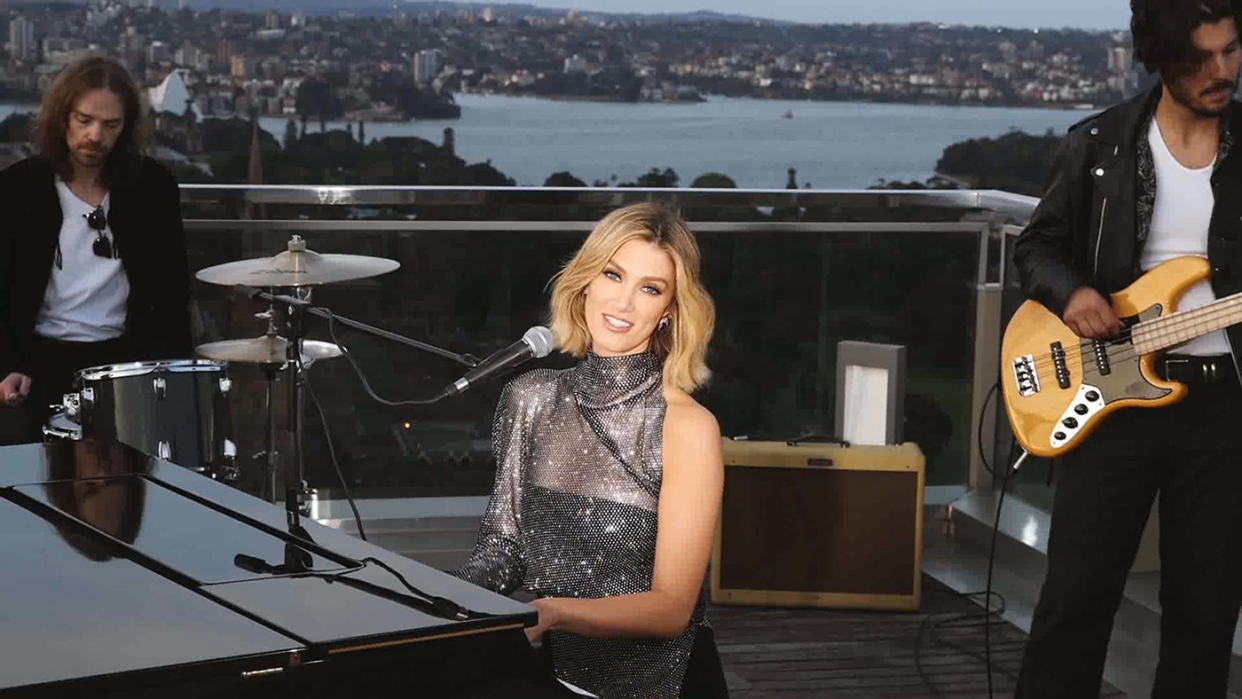 Australian singer Delta Goodrem said she had to learn how to speak - and sing again - after an operation left her with nerve damage (Image: Getty Images)