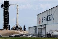 A SpaceX Falcon 9 rocket is shown as it is prepared for another launch attempt for Polaris Dawn, a private human spaceflight mission