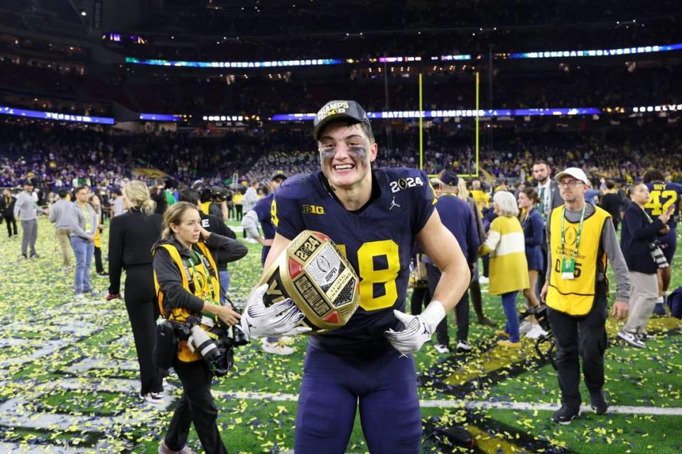 Idaho native Colston Loveland celebrates after winning the college football national title with Michigan on Monday in Houston. Thomas Shea/USA TODAY NETWORK