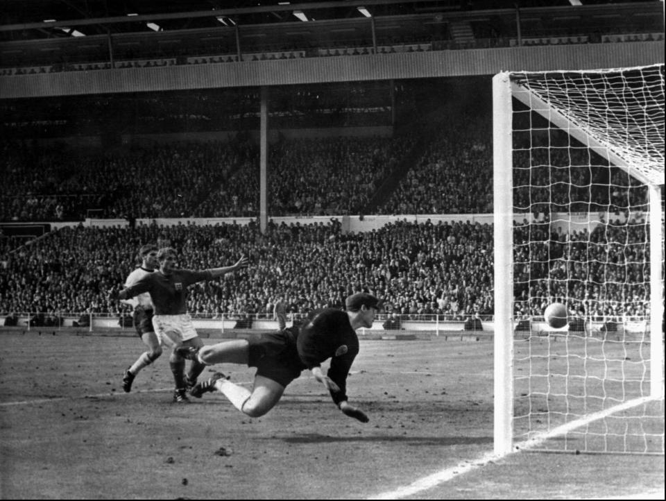 FILE - A shot from England's Geoff Hurst, not in photo, bounces down from the West Germany crossbar during the World Cup final at London's Wembley Stadium on July 30, 1966. The linesman gave it as a goal and England went to to win 4-2. (AP Photo/File)