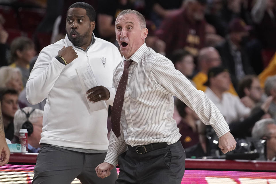 Arizona State head coach Bobby Hurley, right, reacts after a foul call against his team in the second half of an NCAA college basketball against Washington State, Saturday, Feb. 24, 2024, in Tempe, Ariz. (AP Photo/Darryl Webb)