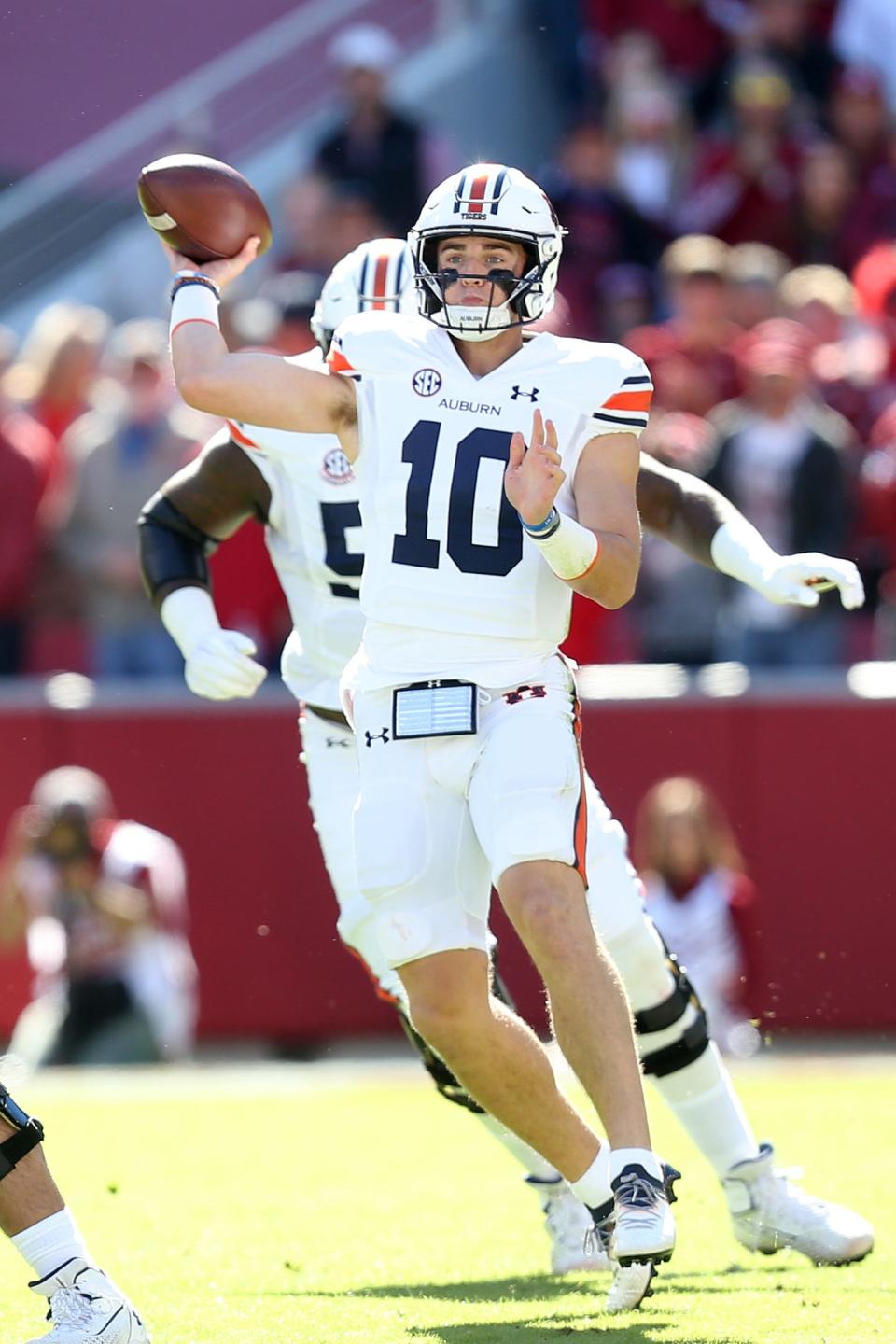 Oct 16, 2021; Fayetteville, Arkansas, USA; Auburn Tigers quarterback Bo Nix (10) passes in the first quarter against the Arkansas Razorbacks at Donald W. Reynolds Razorback Stadium. Mandatory Credit: Nelson Chenault-USA TODAY Sports