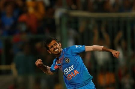 Cricket - India v England - Third T20 International - M Chinnaswamy Stadium, Bengaluru, India - 01/02/17. India's Yuzvendra Chahal celebrates the wicket of England's Joe Root. REUTERS/Danish Siddiqui