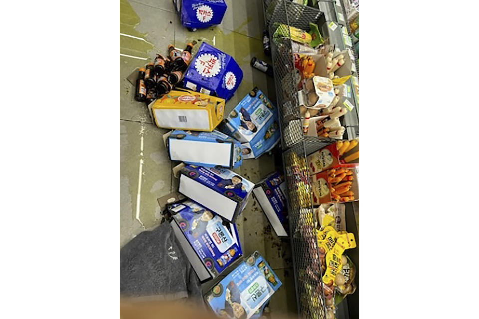 In this photo provided by South Korea's Jeonbuk Fire Safety Headquarters, products are scattered on the floor at a convenience store after an earthquake in Buan, South Korea, Wednesday, June 12, 2024. An earthquake broke windows and caused other minor damage in a fishing community in southwestern South Korea on Wednesday, but no injuries have been reported. (Jeonbuk Fire Safety Headquarters via AP)