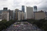 Thousands of pro-democracy protesters gather to march in the streets to demand universal suffrage in Hong Kong July 1, 2014. REUTERS/Tyrone Siu