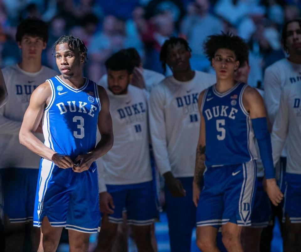 Duke’s Jeremy Roach (3) and Tyrese Proctor (5) watch player introductions prior to their game against Tennessee in the second round of the NCAA Tournament on Saturday, March 18, 2023 at the Amway Center in Orlando, Fla.