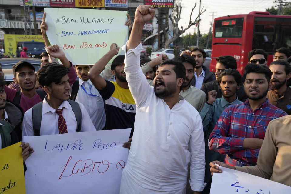 FILE - In this Friday, Nov. 18. 2022 file photo, member of an Islamic student group 'Islami Jamiat-e-Talaba' hold a demonstration against the releasing of '"Joyland" movie, in Lahore, Pakistan. The Pakistani movie and Oscar contender "Joyland" caused uproar last year for its depiction of a relationship between a married man and a trans woman, but it also shone a spotlight on the country's transgender community.Trans people are considered outcasts by many in Pakistan, despite some progress with a law protecting their rights and court rulings that allow them to choose a gender that is neither male nor female. (AP Photo/K.M. Chaudary, File)