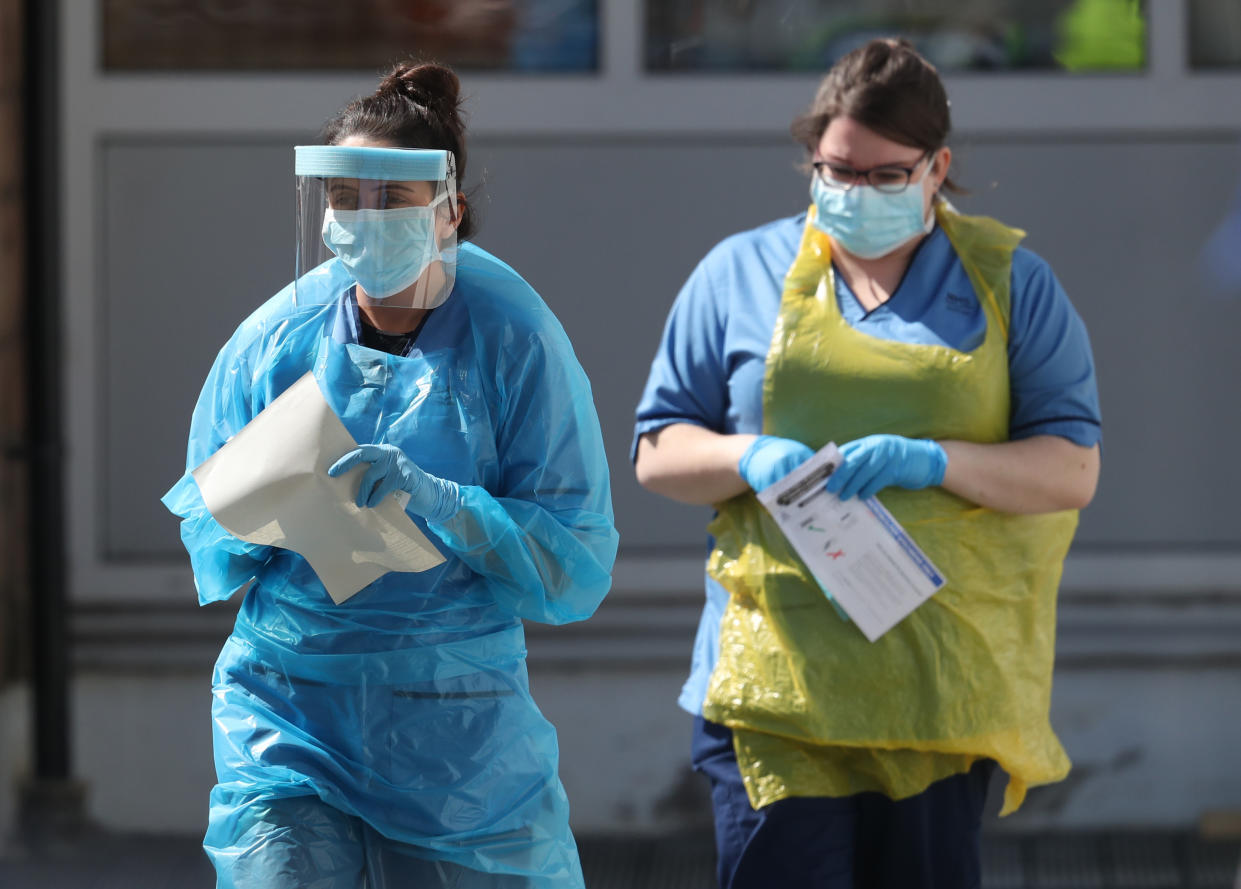 A nurse prepares to take a sample at a COVID 19 testing centre in the car park of the Bowhouse Community Centre in Grangemouth as the UK continues in lockdown to help curb the spread of the coronavirus. (Photo by Andrew Milligan/PA Images via Getty Images)