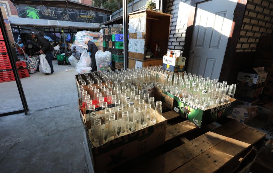 A table of sorted bottles are pictured at Sure We Can, a non-profit recycling center, community space and sustainability hub in Brooklyn, photographed Nov. 16, 2023.