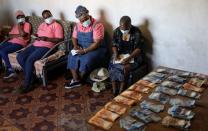 Big banks target South Africa's giant shadow saving clubs